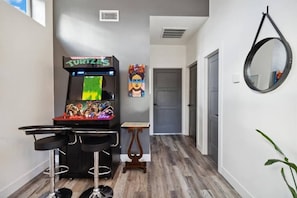 Arcade cabinet with thousands of video games across multiple systems.
