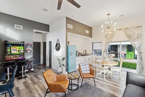 Our open floor plan offers a living room, dining room & kitchenette.