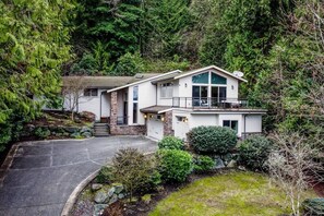 This home has a large driveway and plenty of landscaping to make parking and coming and going easy. Truly is a remote escape surrounded by nature. 
