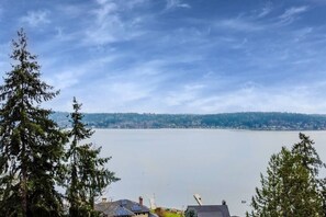 This gorgeous home has a great view of the lake. It is perfect for anyone looking for a place to relax by the water. (shot on drone) 
