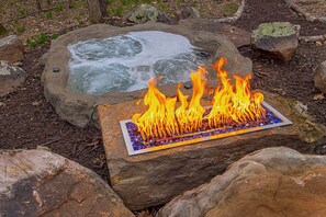 Fire Boulder In Front Of The Hot Tub