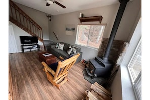 Living room with wood stove.