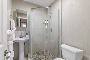 The bathroom comes fully stocked with all of the towels and toiletries you will need for your stay (and a hair dryer too!)