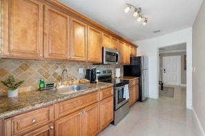 The kitchen in unit 2 (2 bedroom unit) is fully stocked with everything you need to make and enjoy a gourmet meal. We provide coffee, tea, sweeteners and creamers so you can start your morning right!