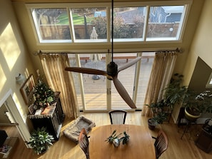 Birdview of the dining area and patio from upstairs