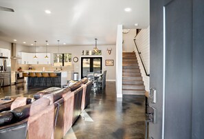 Polished concrete Floors with Radiant heating on main floor. Smart Lock entry. 