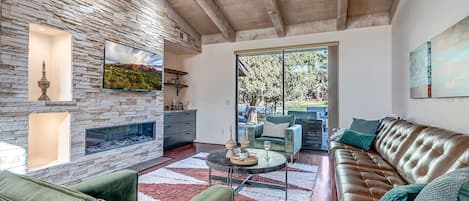 Beautiful Stone Wall and High Wood Beam Ceiling