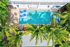 The beautiful pool and spa are enveloped by lush tropical foliage, creating a private and tranquil oasis at Newfound Oasis.