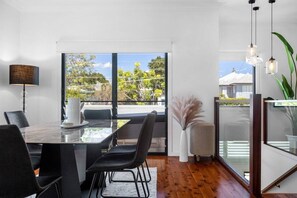 Indoor dining area and internal stairs