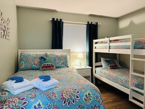 Bedroom 2: Bunks + Double Bed

Smart TVs in both bedrooms!