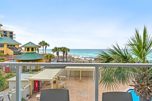 balcony view of beach and pool