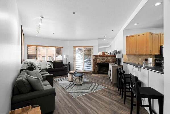 The condo is a comfortable and stylish space featuring an open kitchen and living room area creating a lovely dynamic room for your group to relax in.