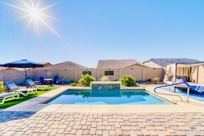 Sparkling pool with lots of places to lounge!