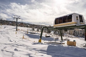 Ski lift just outside building entry