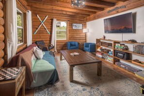 The game room features plenty of board games, gaming console, and puzzles.