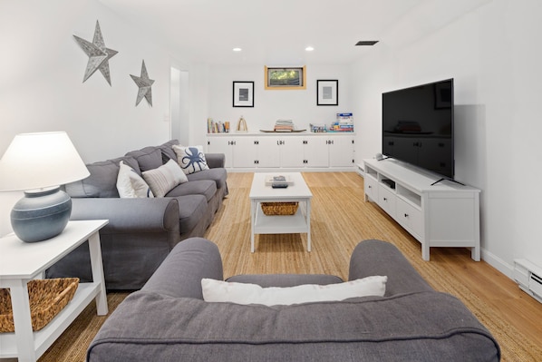 Basement family room with large screen t.v. & comfy seating