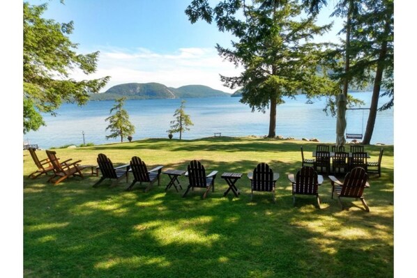 View of lawn and Rogers Rock from interior porch