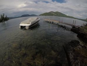 Dock can comfortably moor boats up to 21' long. Pontoon boats can be too long.