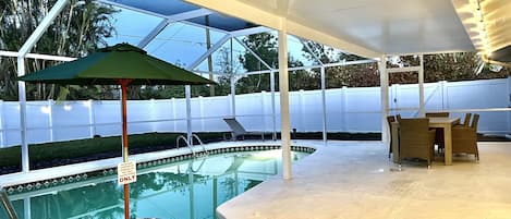 Heated Pool w/ built-in table and bench   6 Person dining and 2 loungers