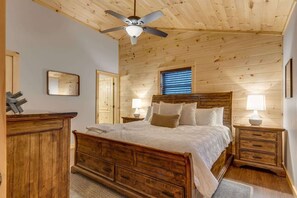 Master bedroom with king mattress and private bathroom.