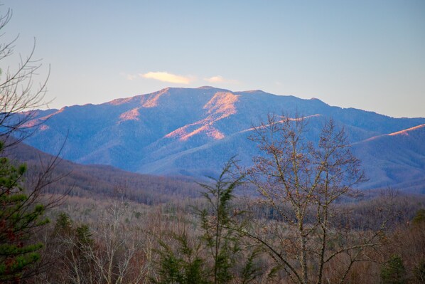 Stunning mountain views from the log cabin deck.