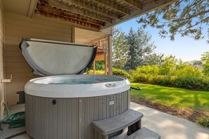 Relax in the spacious hot tub with your friends and family