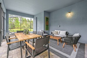 Covered outdoor dining and lounging on terrace