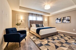 Bedroom 3, upstairs, with king bed & stylish decor