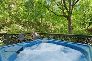 Privacy and lush views from the hot tub overlooking 2 acres rhododendron forest