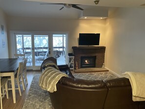 Sectional couch around gas fireplace 