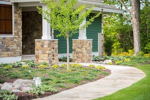 So many native trees, bushes, and flowers surround the home.