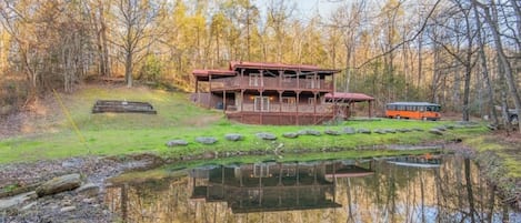 You’ll have your own spring-fed creek in the picturesque front yard. 