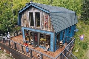 Private serenity on 5 acres, 2BR, 2 BA with large deck and adventure.