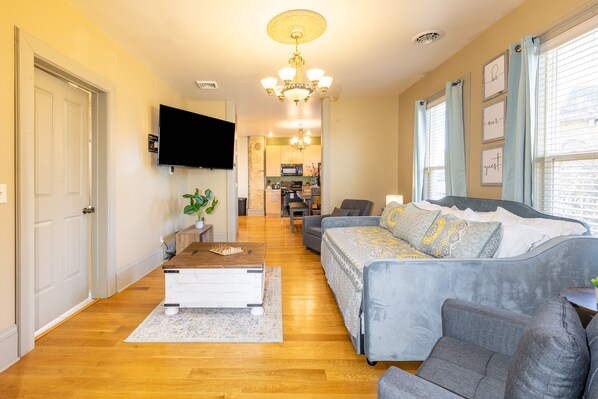 Welcome to Woodman Estate.  A view of living room into the kitchen. 