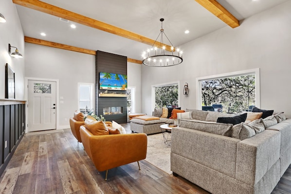 Modern interior with electric fire place in living room.