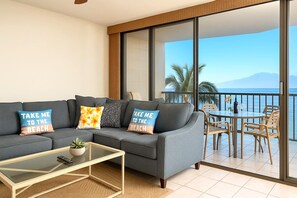 Glass walls open to palm-fringed ocean views, inviting you to relax with a cocktail and a salty breeze. VIR-508