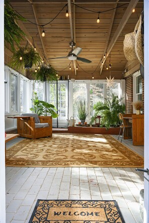 Sunroom.  Sunshine filled and flexible to use.