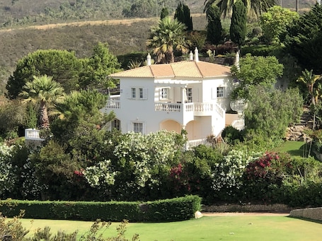 Our villa - with lush gardens and national park right behind