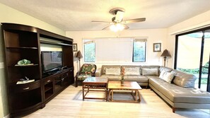 Large living room with open space for dining room and kitchen