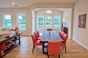 Enjoy Scrumptious Meals From Dining Area Looking Out Over the Lake and Fountain and Woods  Seats 8 Plus Four More at the Kitchen Counter