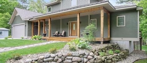 front of the house, large garage ,circle driveway. Huge deck w/views of Lake Mi.