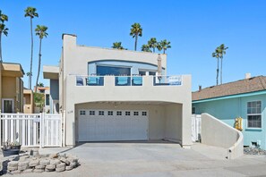 Modern coastal charm meets convenience in this spacious home, large garage and drive way for up to 4 vehicles.