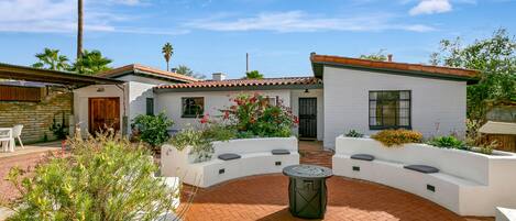 The front of our gorgeous home, with its spacious front yard. 