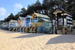 28 Chapel Yard, Wells-next-the-Sea: The colourful beach huts at Wells beach