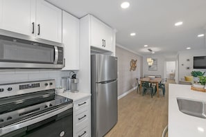 Updated Kitchen. Microwave currently out of service. A table top microwave has been added.