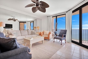 The living area offers not only comfort but also a stunning view of the ocean just outside. You can unwind in style while enjoying the soothing sights and sounds of the ocean waves rolling in.