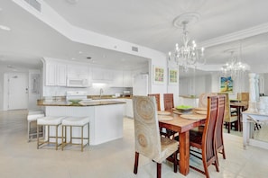 The integrated kitchen & dining area offer both functionality and style. With modern appliances and a sleek design, it's perfect for preparing delicious meals and enjoying them in the comfort of your home away from home.