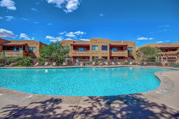 Large heated community pool with spa