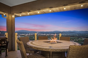 The balcony is equipped with a premium gas grill, perfect for preparing meals while taking in the mountain scenery