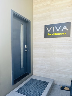 Main entrance to VIVA Residences building.